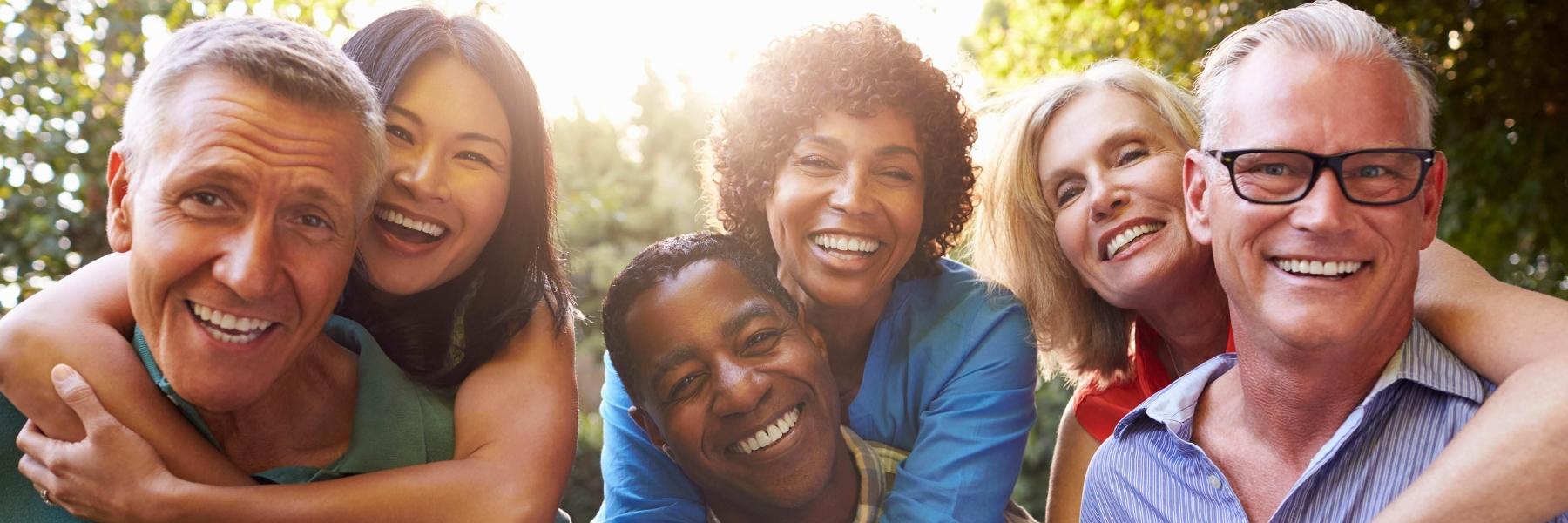 three male and female couples smiling 